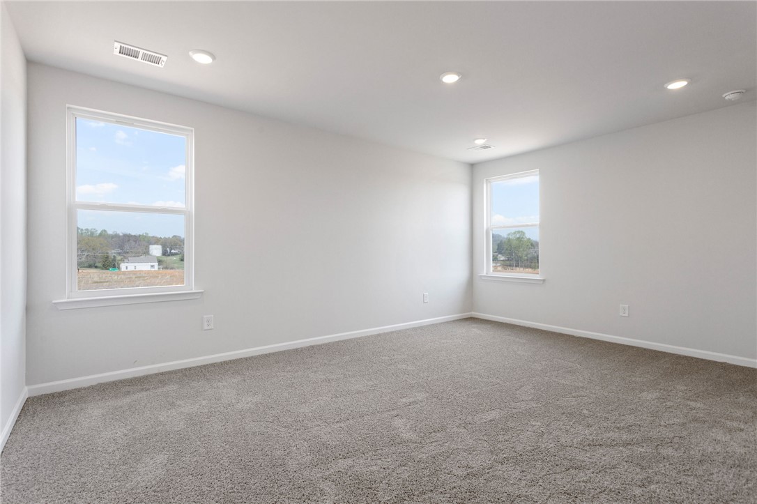 135 Cedar Shoals Easley, SC 29640 - Photo 20 of 37 Bright and airy, this room offers expansive views and a welcoming atmosphere.
