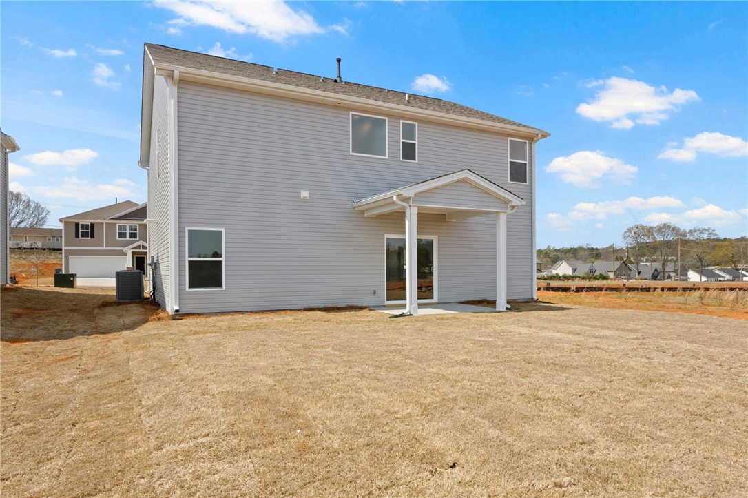 135 Cedar Shoals Easley, SC 29640 - Photo 32 of 37 This newly constructed home boasts a spacious yard, perfect for outdoor living.