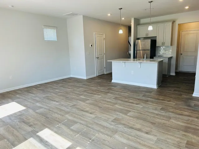 a view of a kitchen with a sink