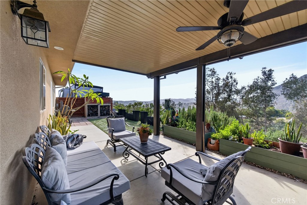 2914 Vista Del Rio Fallbrook, CA 92028 - Photo 20 of 57 a view of a patio with couches chairs and a potted plant