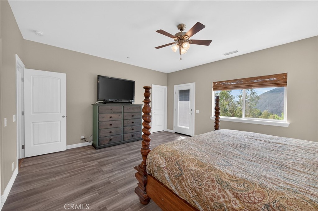 2914 Vista Del Rio Fallbrook, CA 92028 - Photo 42 of 57 a bedroom with a bed and a flat screen tv