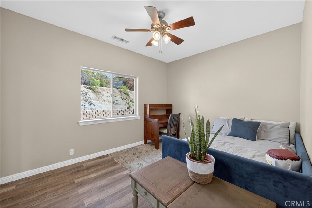 2914 Vista Del Rio Fallbrook, CA 92028 - Photo 50 of 57 a living room with furniture and a potted plant