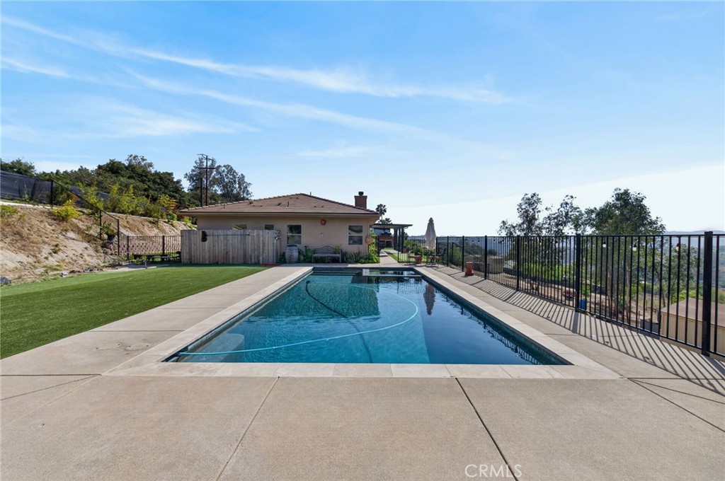 2914 Vista Del Rio Fallbrook, CA 92028 - Photo 8 of 57 a view of a house with a swimming pool