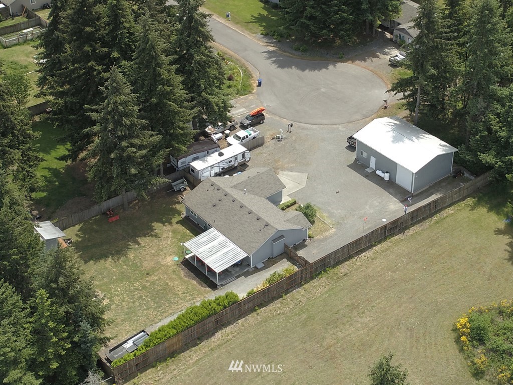 5436 187th Court Southwest Rochester, WA 98579 - Photo 23 of 25 an aerial view of a house with a yard