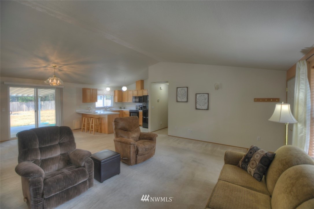 5436 187th Court Southwest Rochester, WA 98579 - Photo 5 of 25 a living room with furniture and a couch