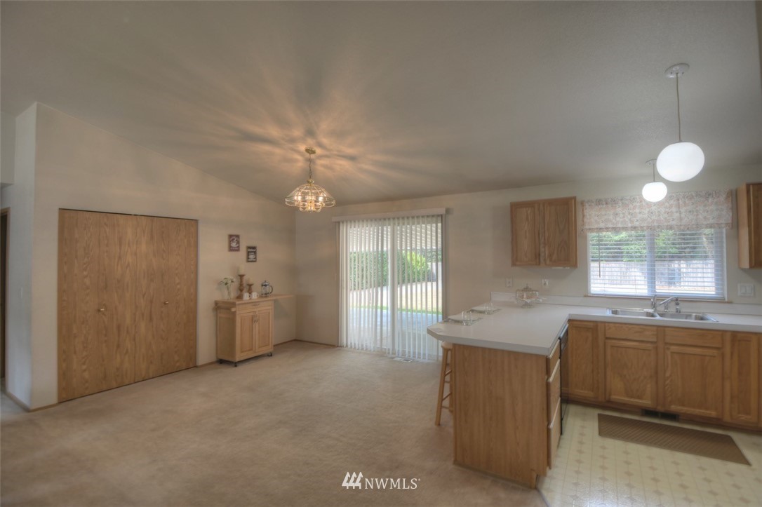 5436 187th Court Southwest Rochester, WA 98579 - Photo 8 of 25 a view of a kitchen and a sink