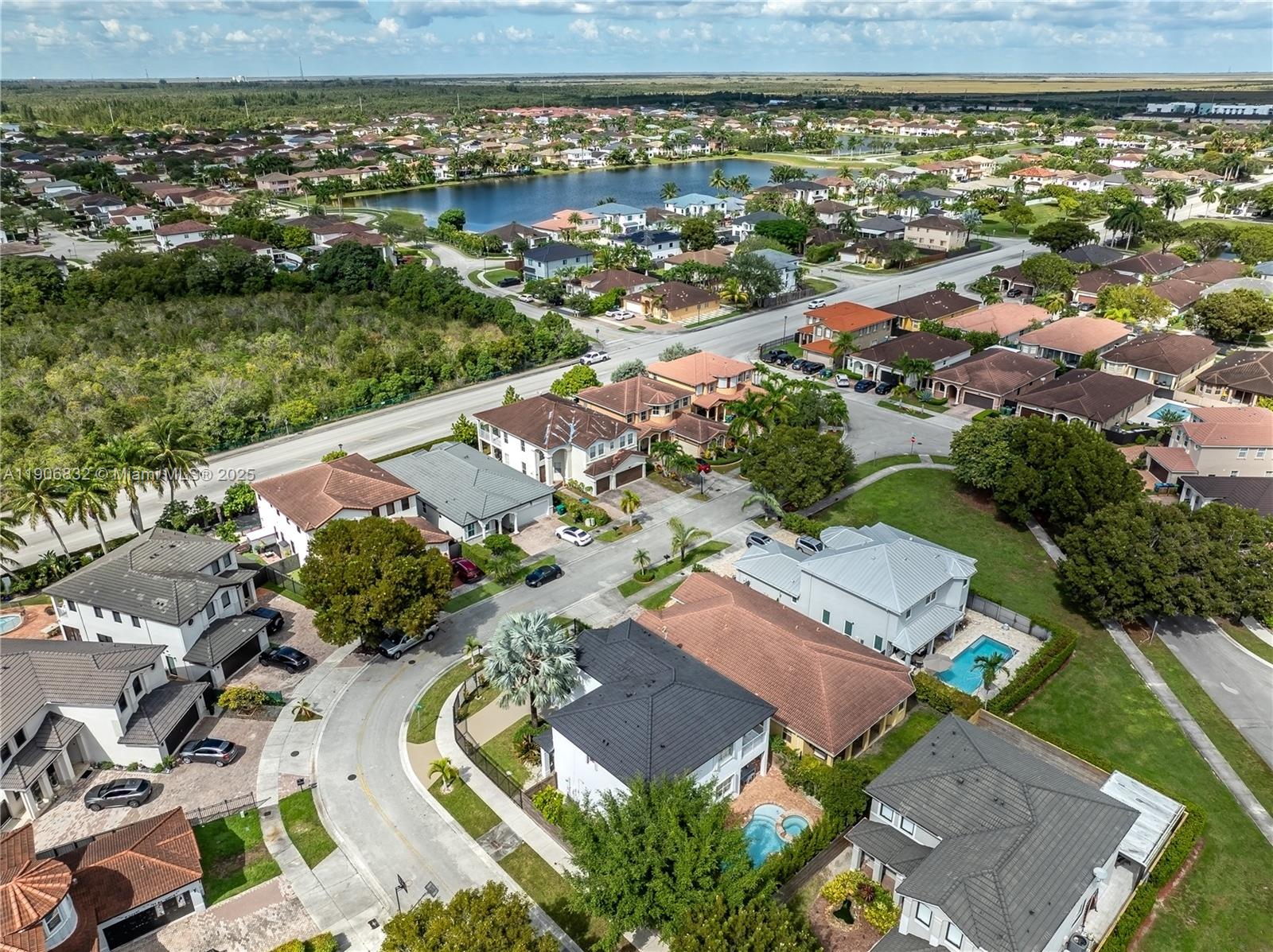1733 Southwest 151 Place Miami, FL 33185 - Photo 8 of 43 an aerial view of residential houses with outdoor space and river