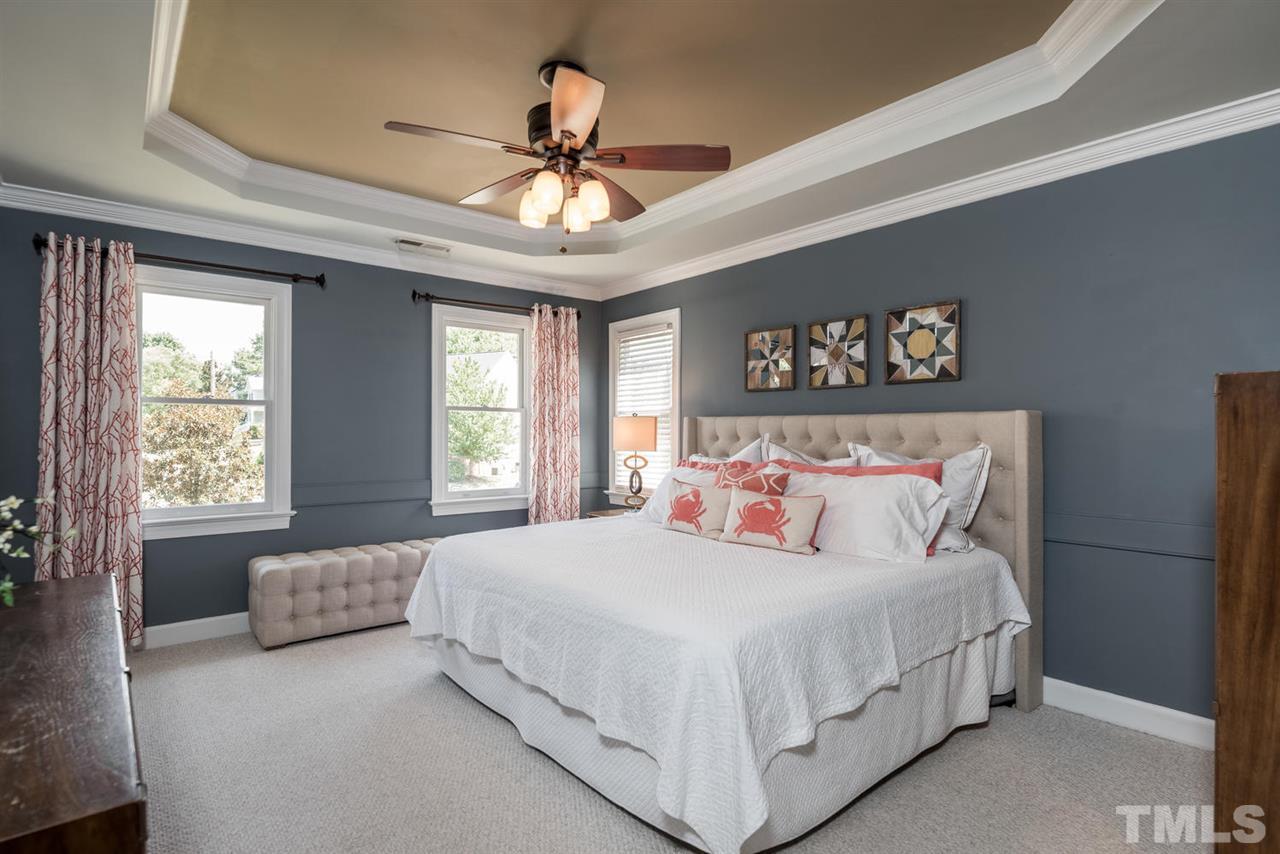 2612 Dahlgreen Road Raleigh, NC 27615 - Photo 14 of 25 a bedroom with a large bed and a window