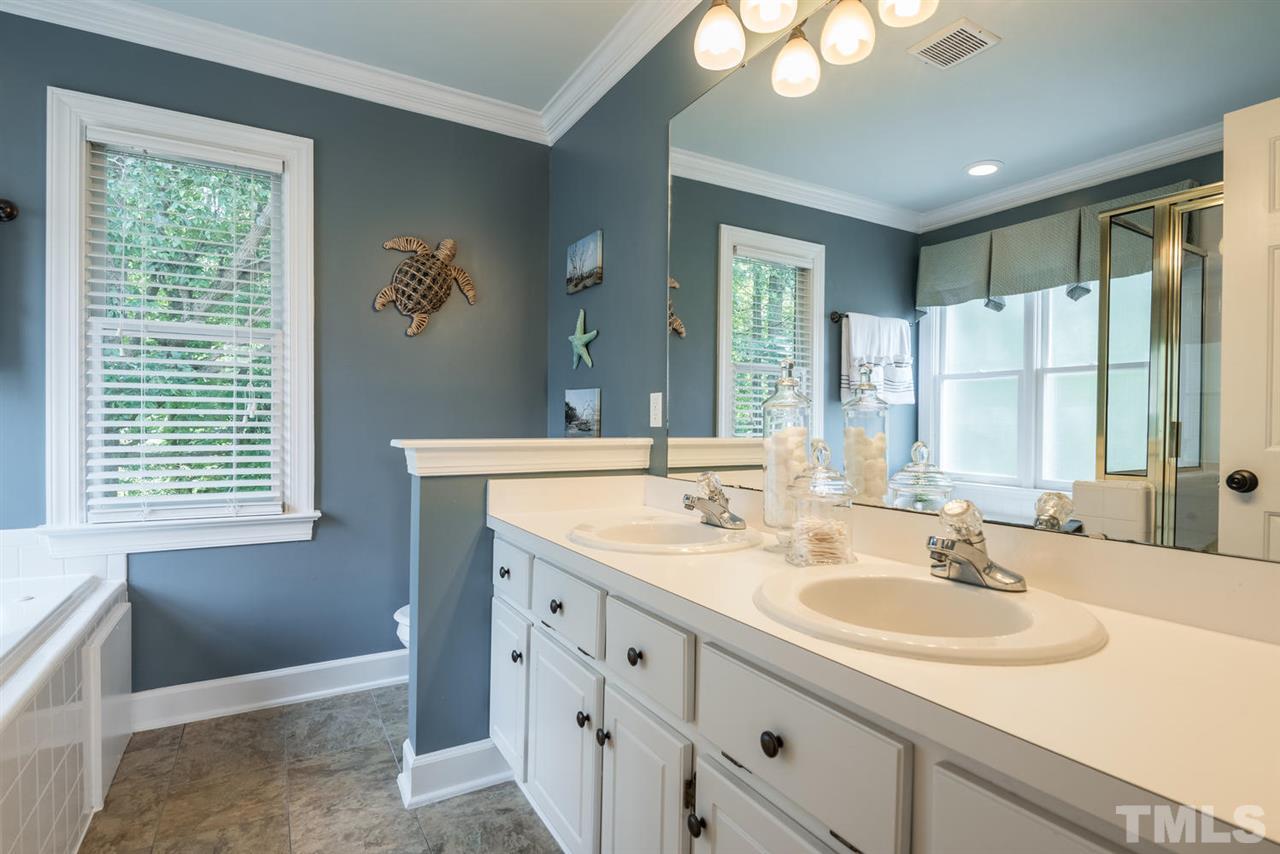 2612 Dahlgreen Road Raleigh, NC 27615 - Photo 15 of 25 a bathroom with a sink double vanity and a mirror