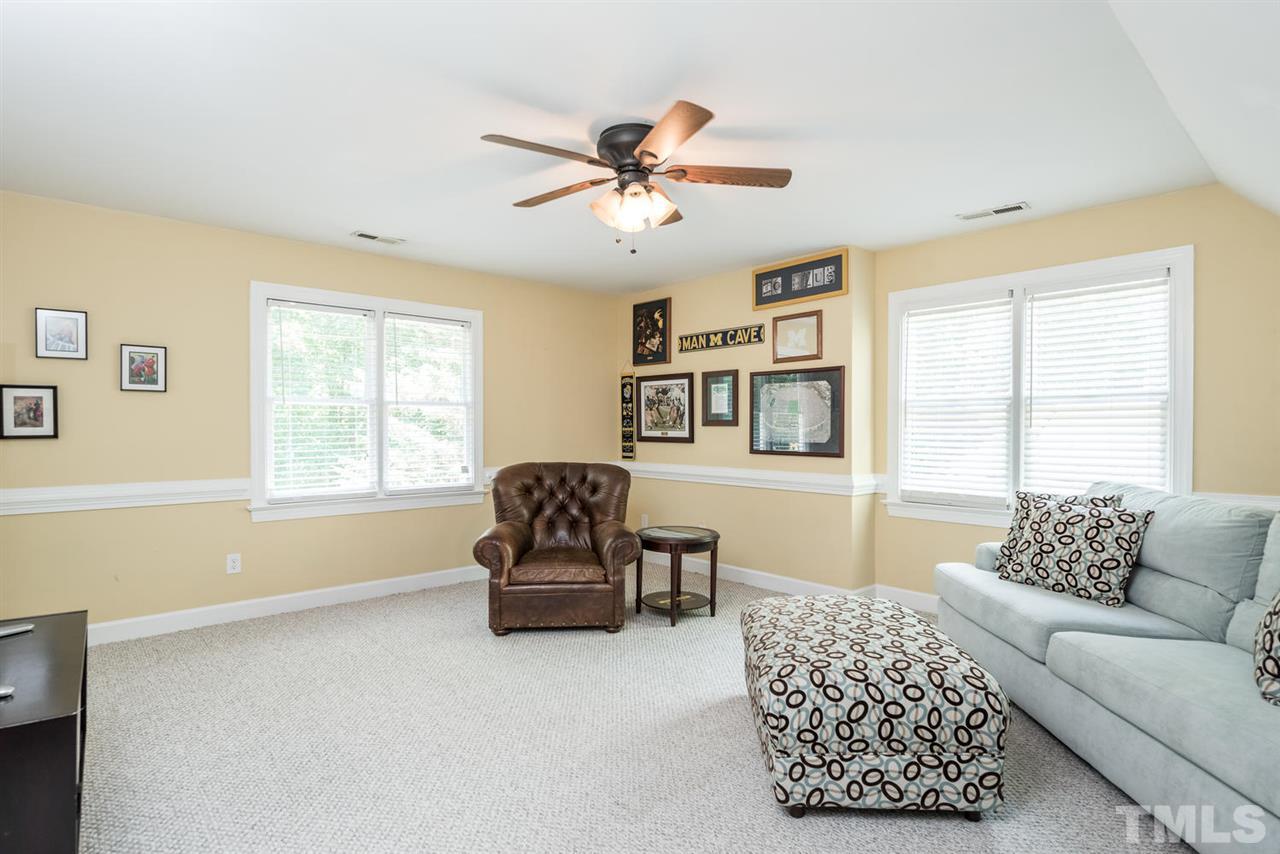 2612 Dahlgreen Road Raleigh, NC 27615 - Photo 20 of 25 a living room with furniture and a window