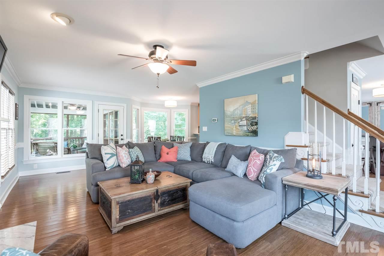 2612 Dahlgreen Road Raleigh, NC 27615 - Photo 7 of 25 a living room with furniture and a large window