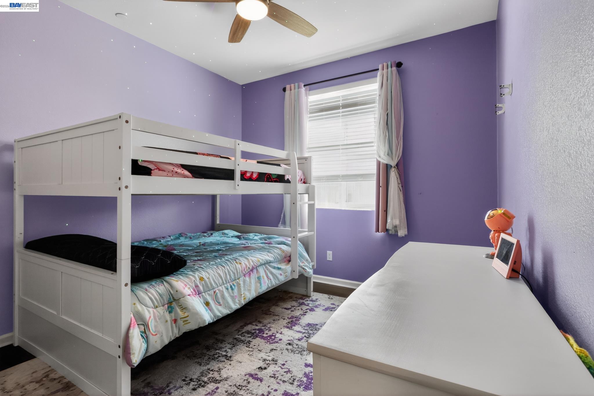 1974 Garden Lane Rio Vista, CA 94571 - Photo 12 of 19 a bedroom with a bed and a window