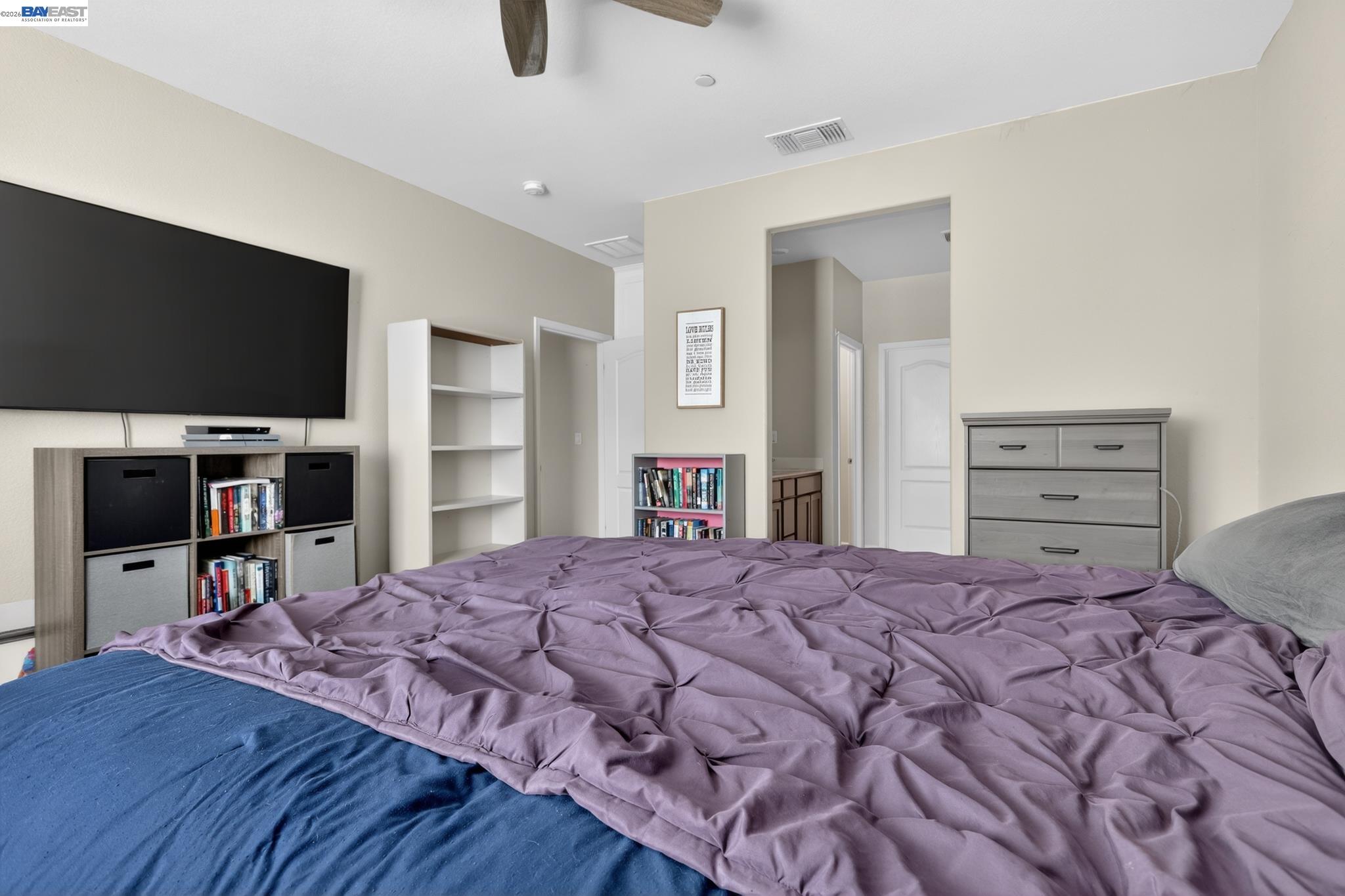 1974 Garden Lane Rio Vista, CA 94571 - Photo 15 of 19 a bedroom with a bed and a flat screen tv