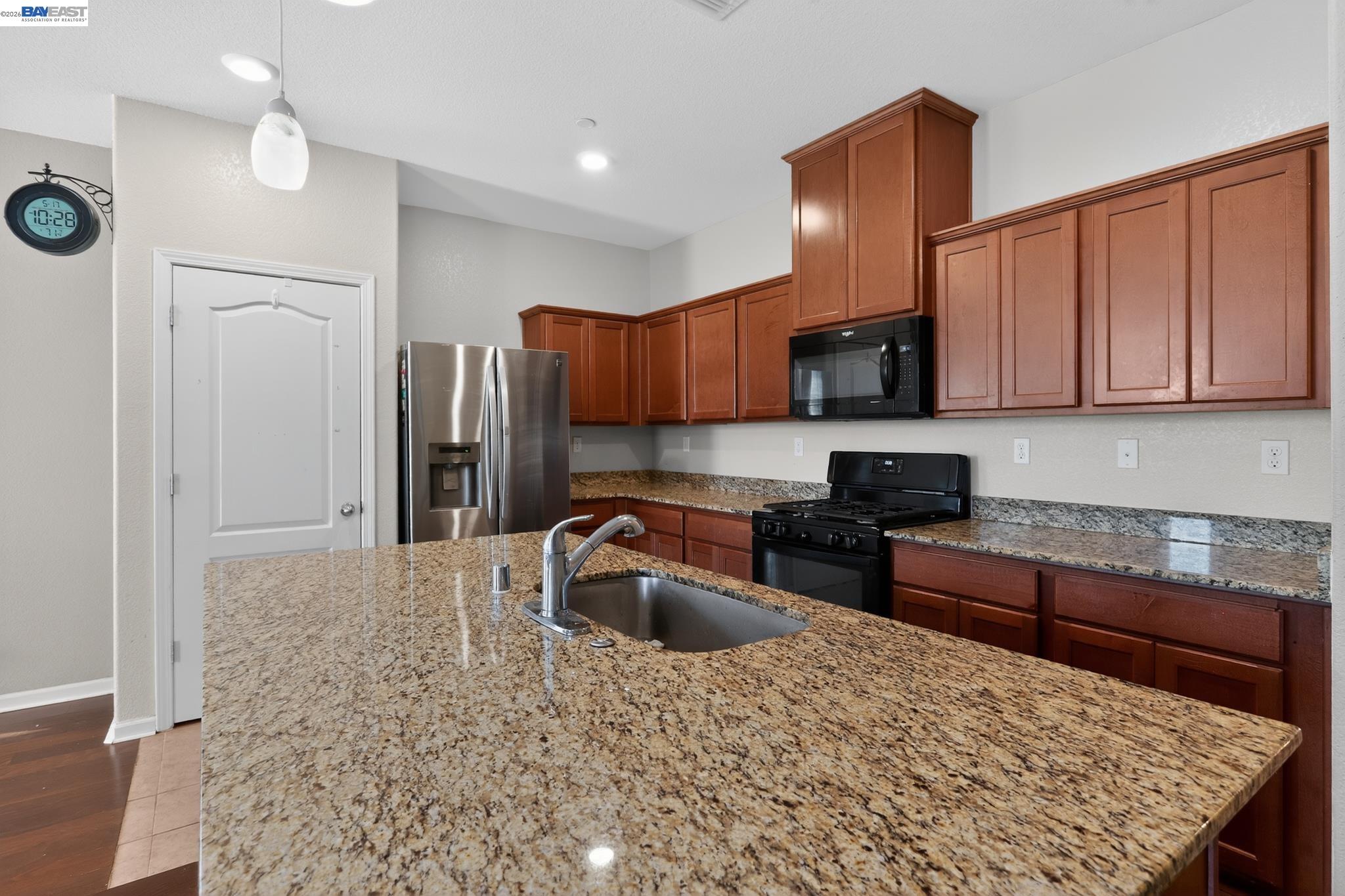1974 Garden Lane Rio Vista, CA 94571 - Photo 8 of 19 a kitchen with stainless steel appliances granite countertop a sink stove and refrigerator