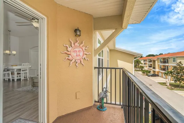 a view of a balcony and chairs