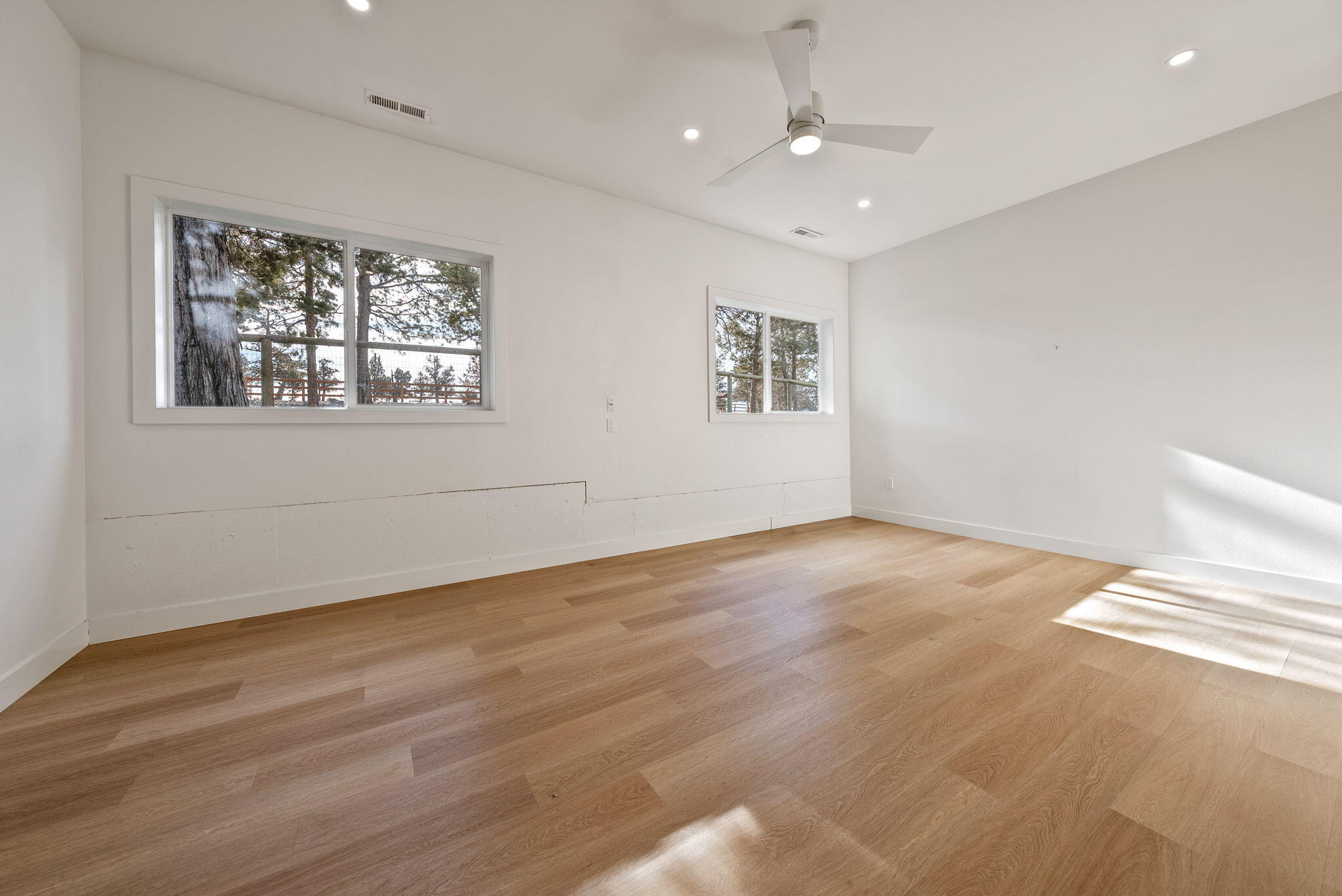 65345 Tweed Road Bend, OR 97703 - Photo 52 of 90 wooden floor in an empty room with a window