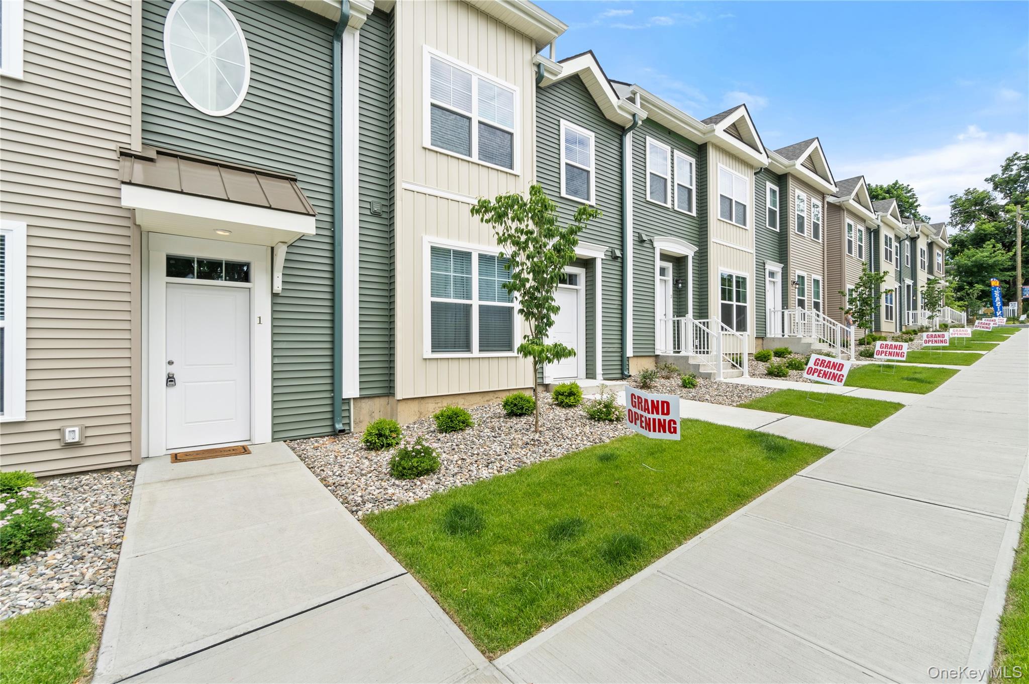75 Forester Avenue, Unit TH4 Warwick, NY 10990 - Photo 1 of 1 a view of a building with a yard