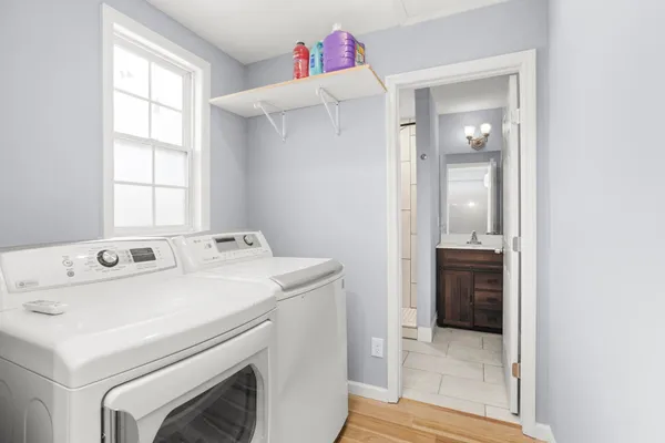 a utility room with dryer and washer