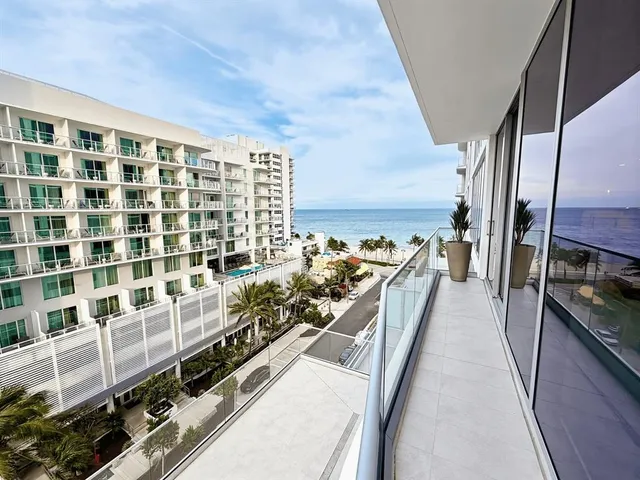a view of a large kitchen with a large window