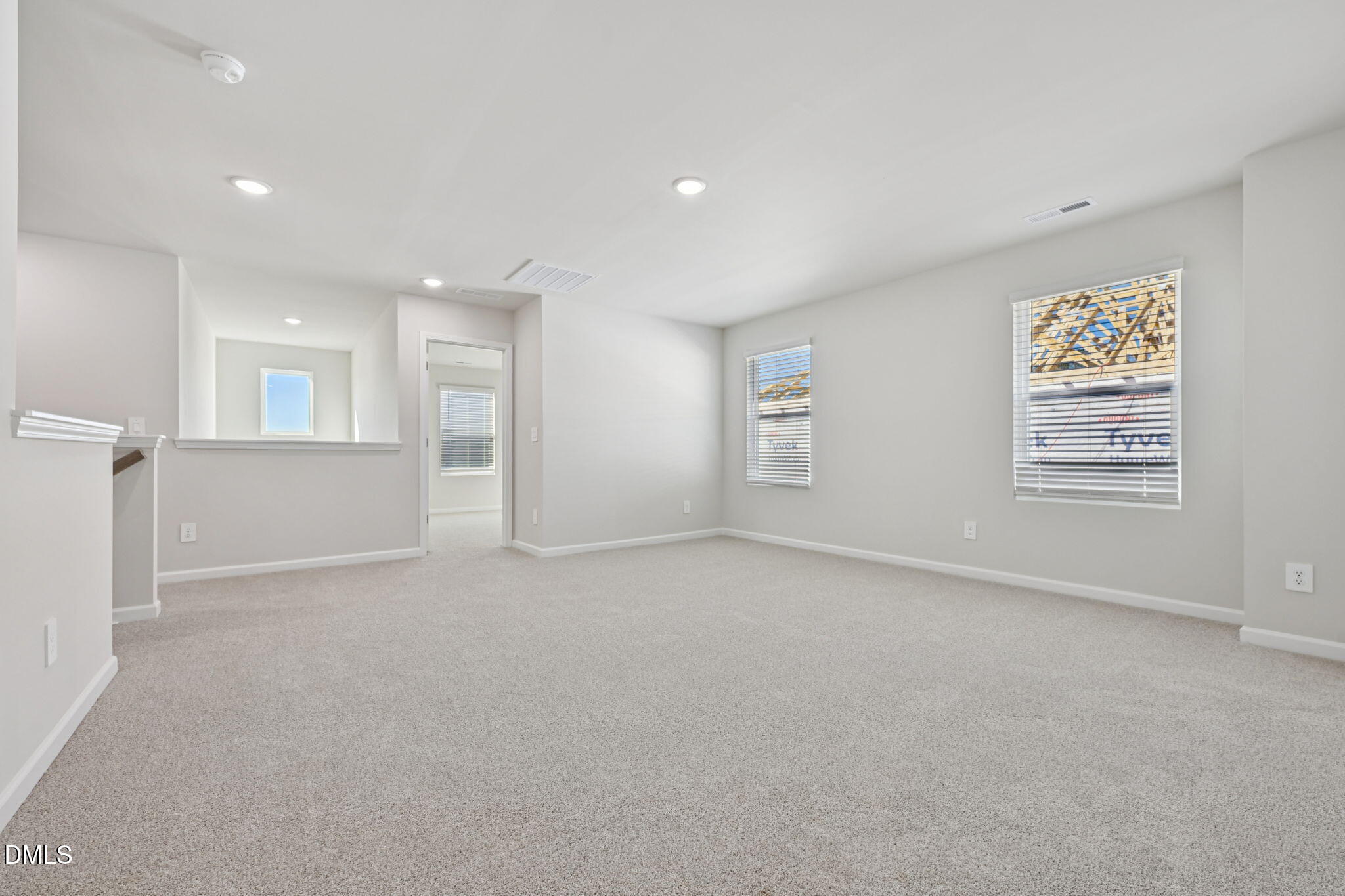 2145 Topsail Road Durham, NC 27703 - Photo 26 of 49 an empty room with windows and closet