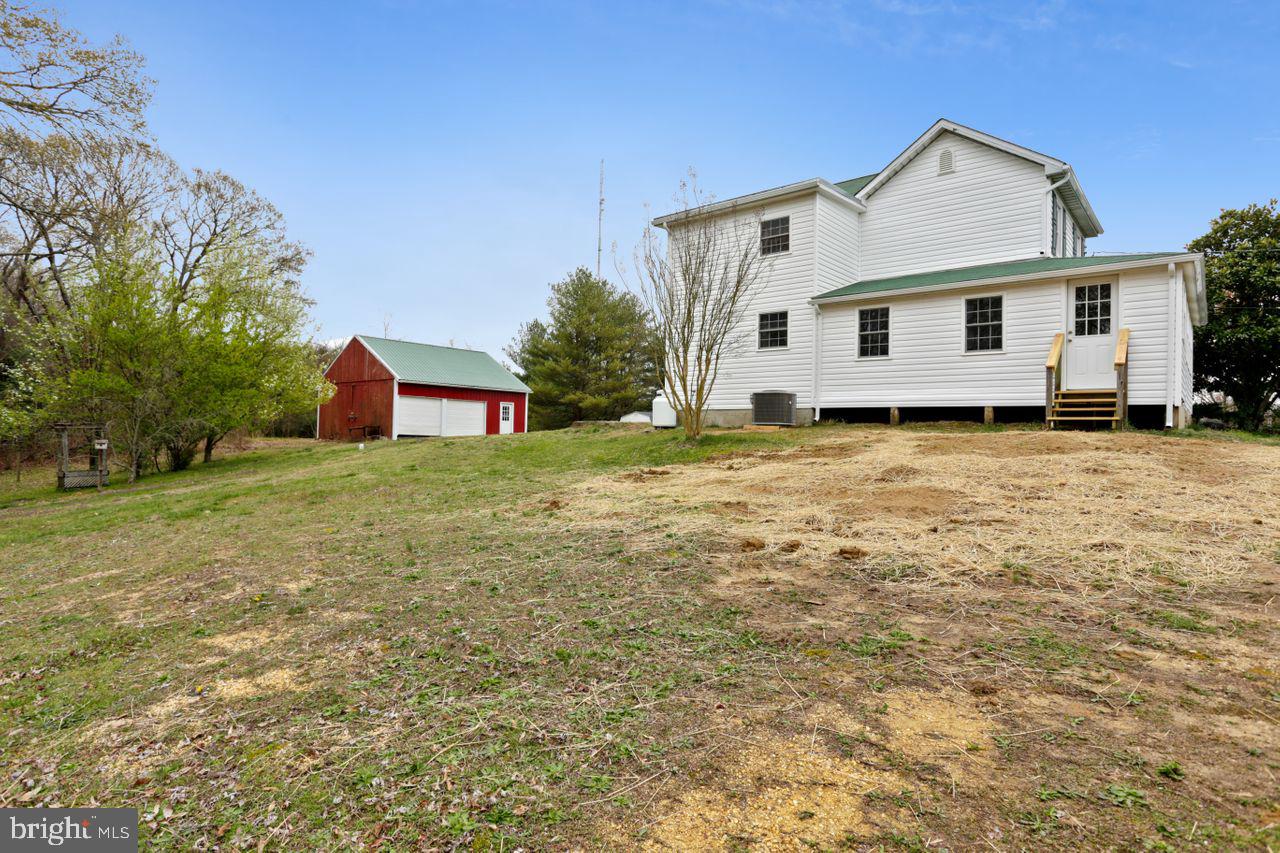 3810 Hallowing Point Road Prince Frederick, MD 20678 - Photo 2 of 27 Another View of House and 2 Car Garage