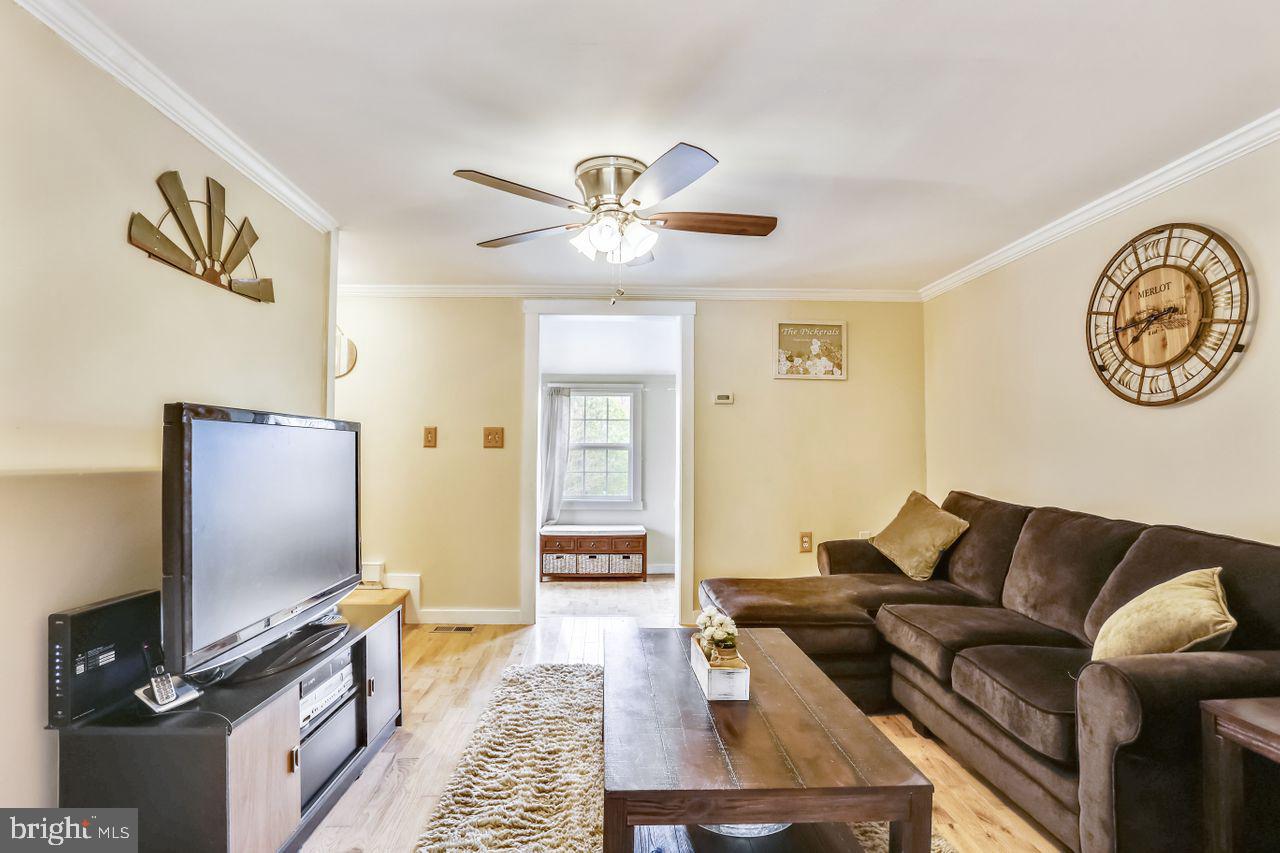 3810 Hallowing Point Road Prince Frederick, MD 20678 - Photo 7 of 27 Living Room Leading into Sun Room