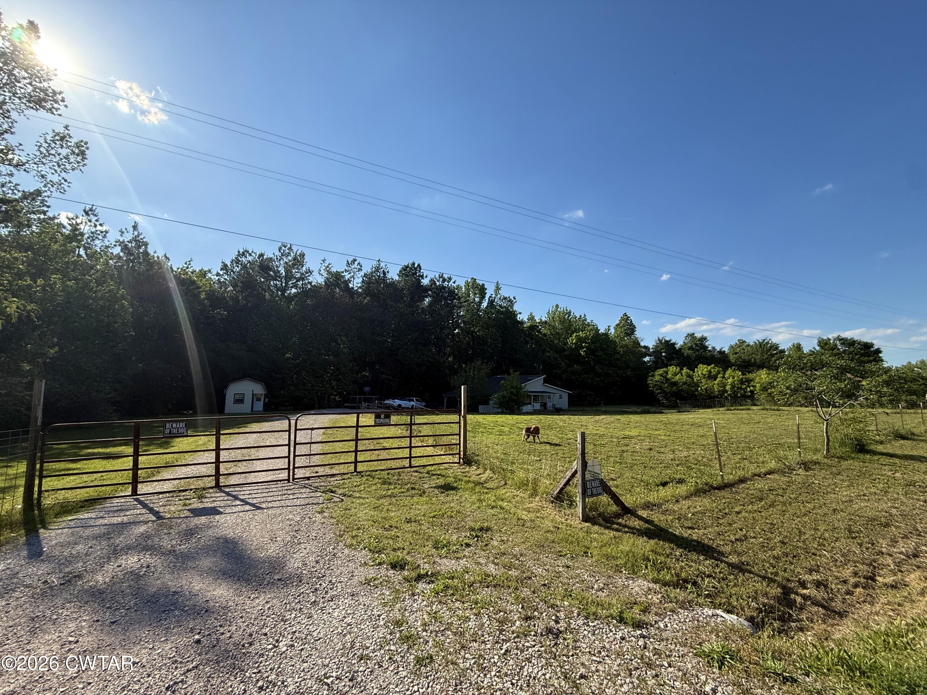 6600 Leapwood Enville Road Adamsville, TN 38310 - Photo 4 of 17 Front Gated Entry