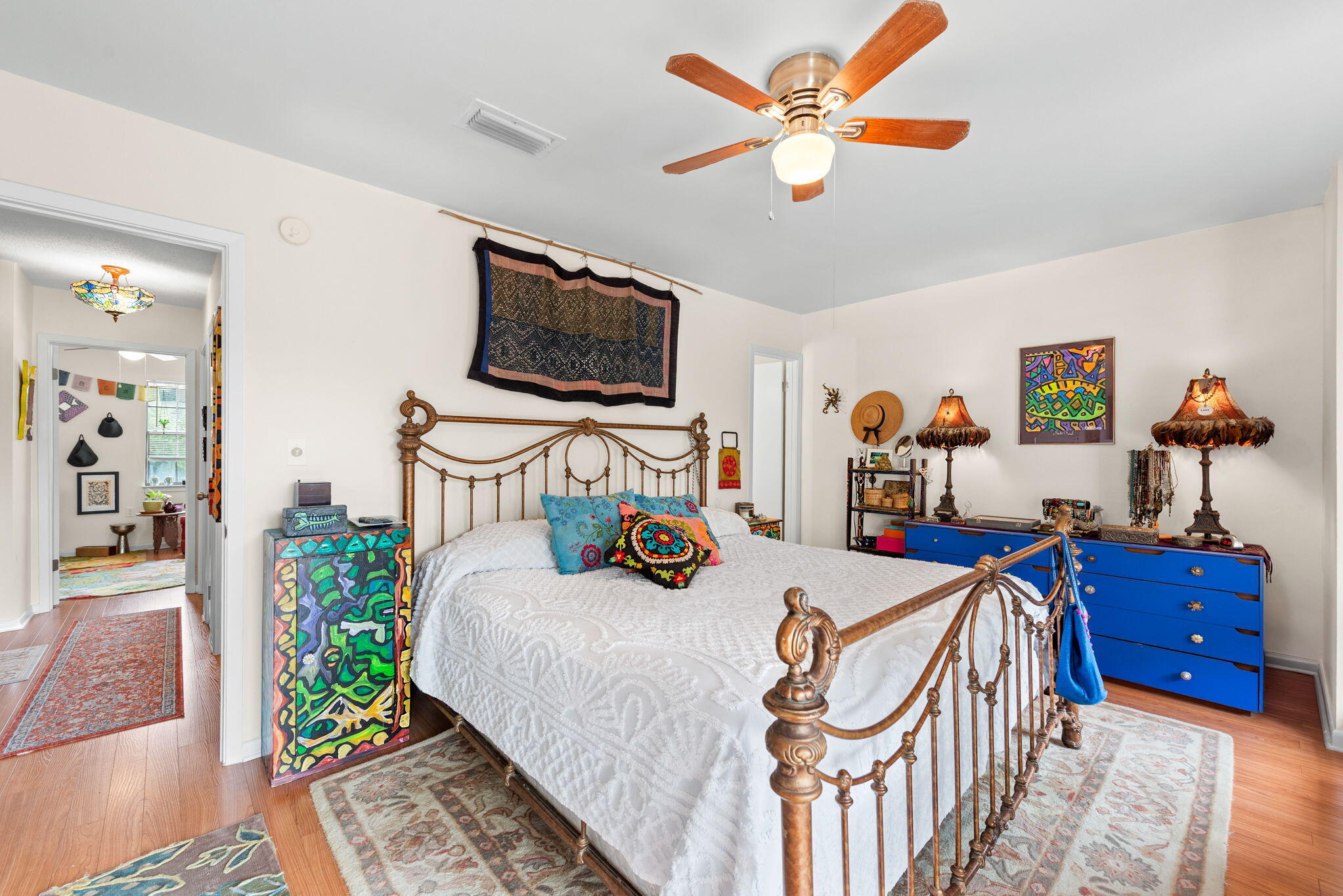 37 12th Street, Unit V126 Shalimar, FL 32579 - Photo 15 of 26 a bedroom with furniture and a flat screen tv