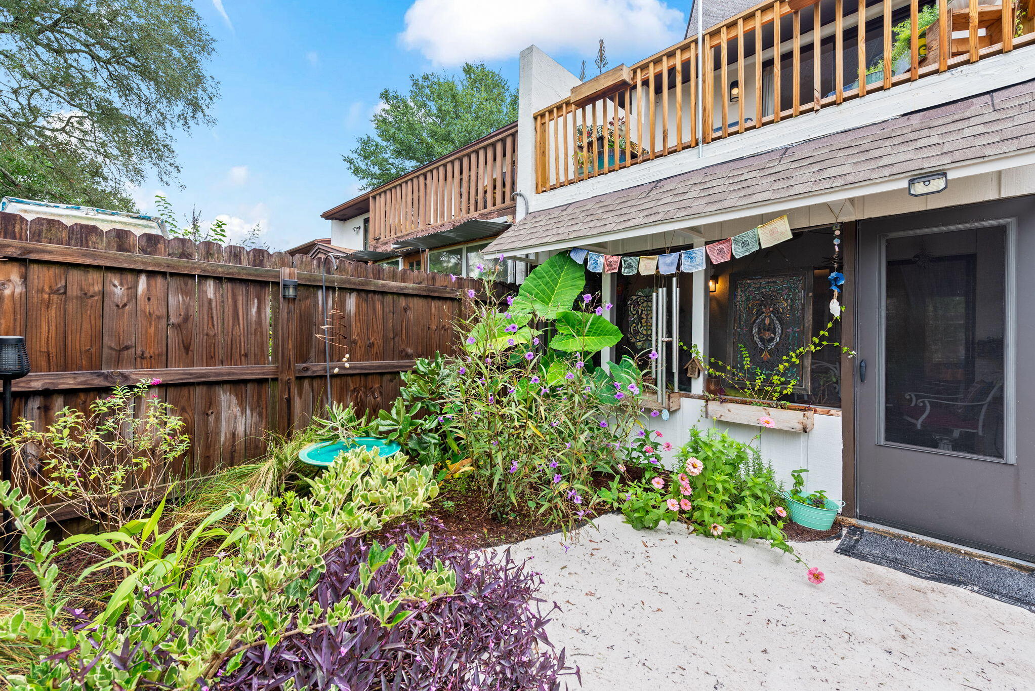 37 12th Street, Unit V126 Shalimar, FL 32579 - Photo 20 of 26 a view of a house with wooden fence