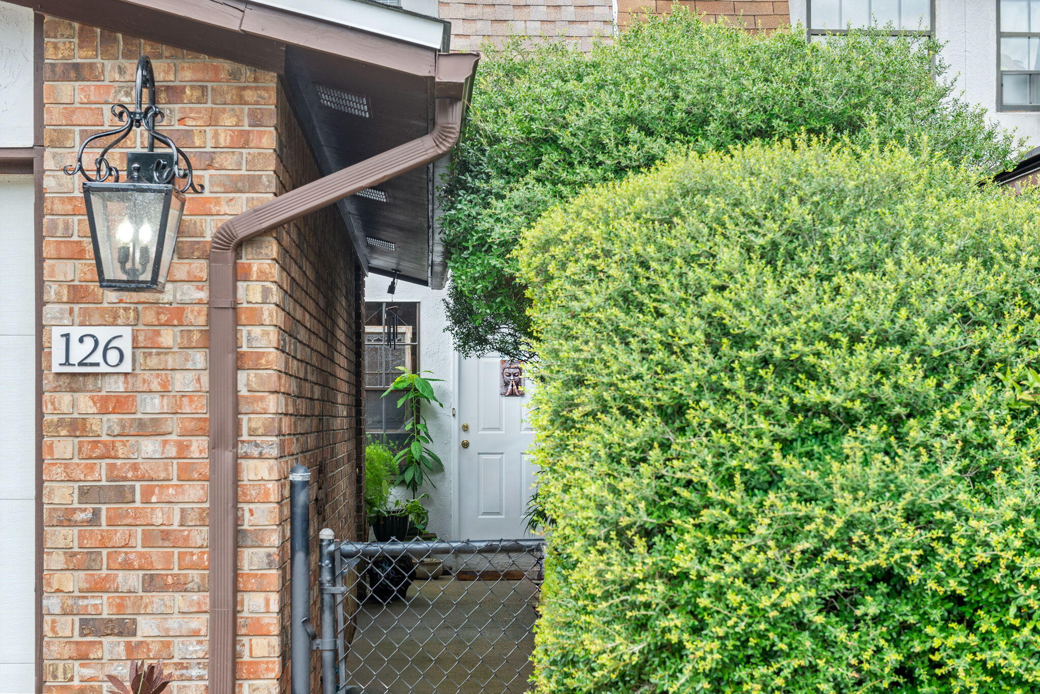 37 12th Street, Unit V126 Shalimar, FL 32579 - Photo 22 of 26 a backyard of a house with lots of green space