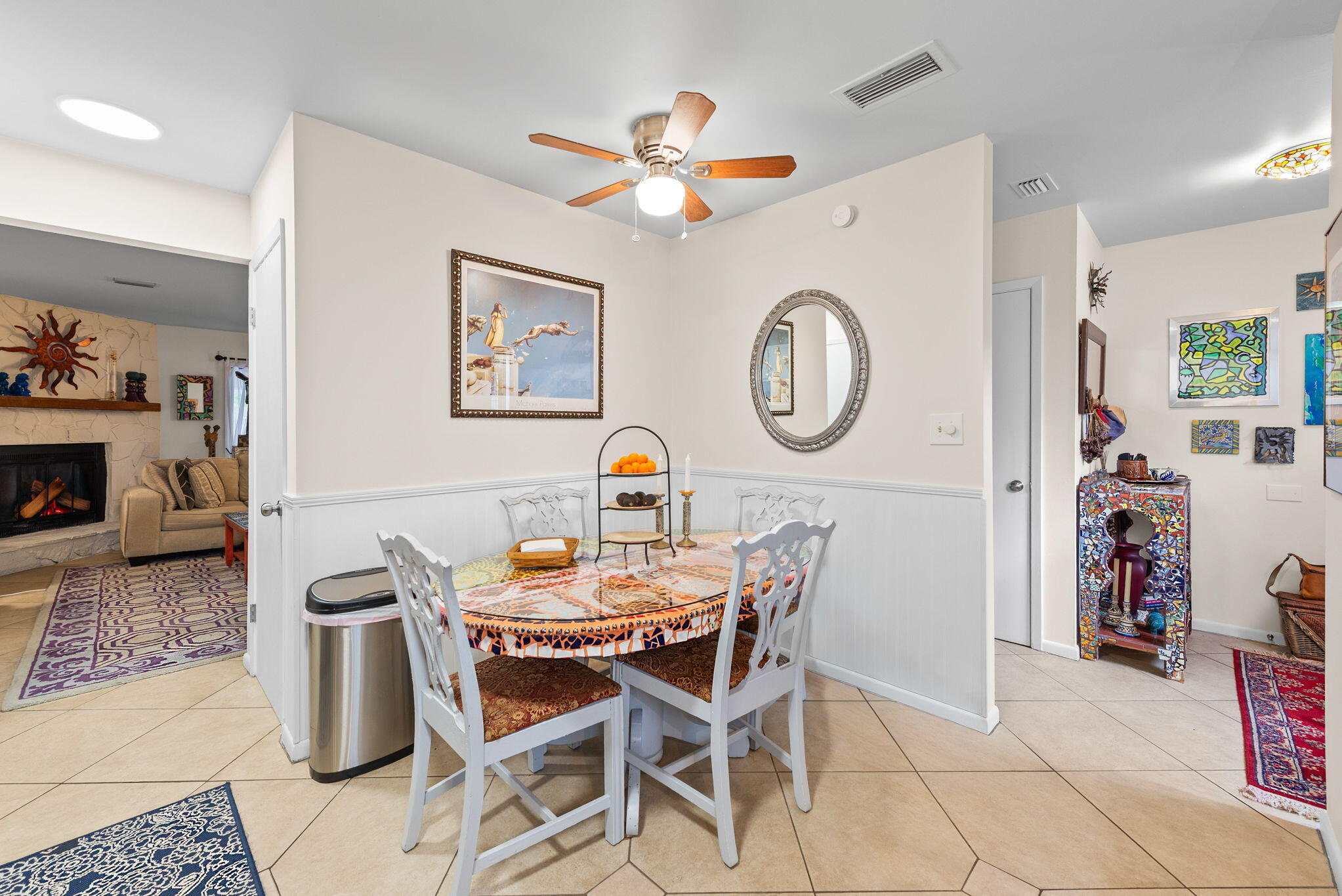 37 12th Street, Unit V126 Shalimar, FL 32579 - Photo 8 of 26 a dining room with furniture and a clock