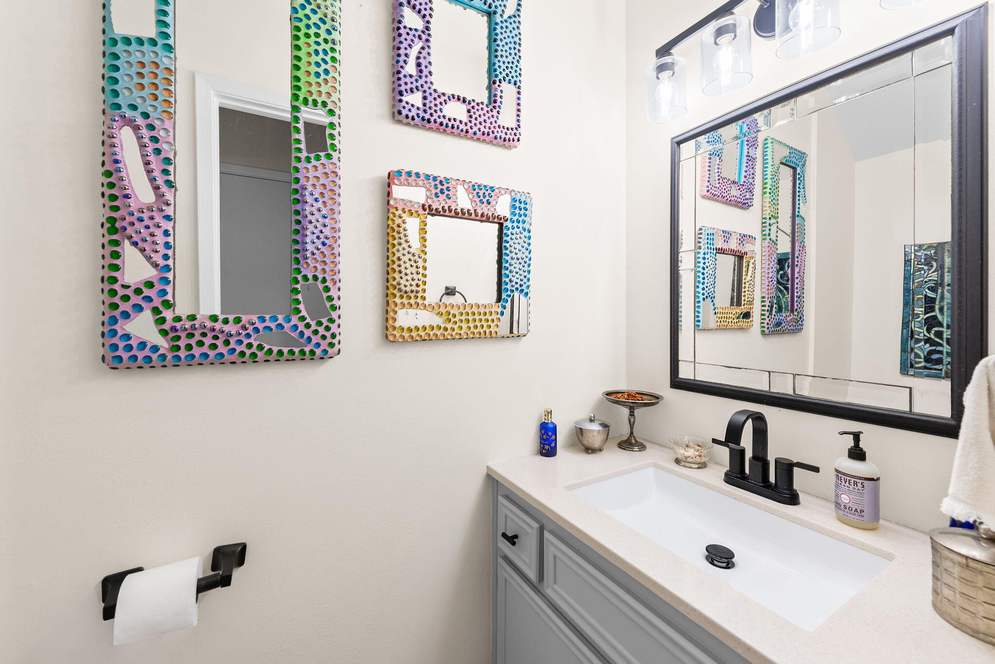 37 12th Street, Unit V126 Shalimar, FL 32579 - Photo 9 of 26 a bathroom with a sink and a mirror