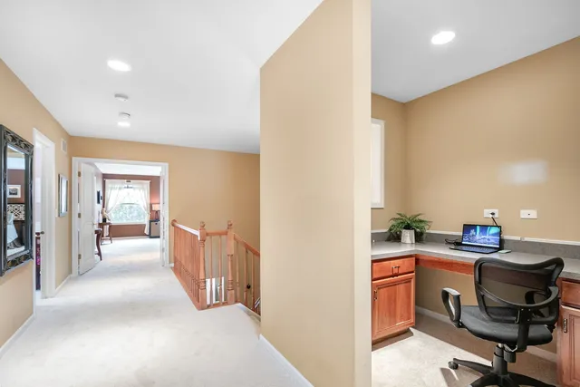 a en suite bathroom with a sink a mirror and a bathtub