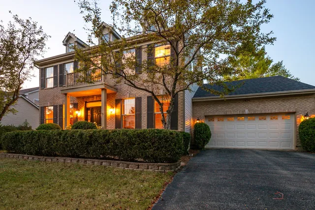 a view of a patio with couches chairs and a potted plant