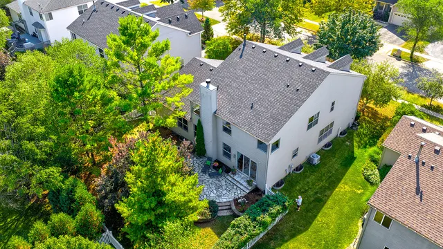 a picture of a bench in front of a wall