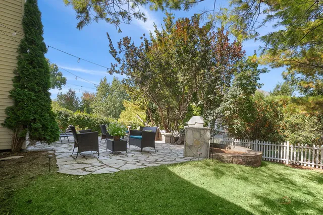 a view of a garden with a bench