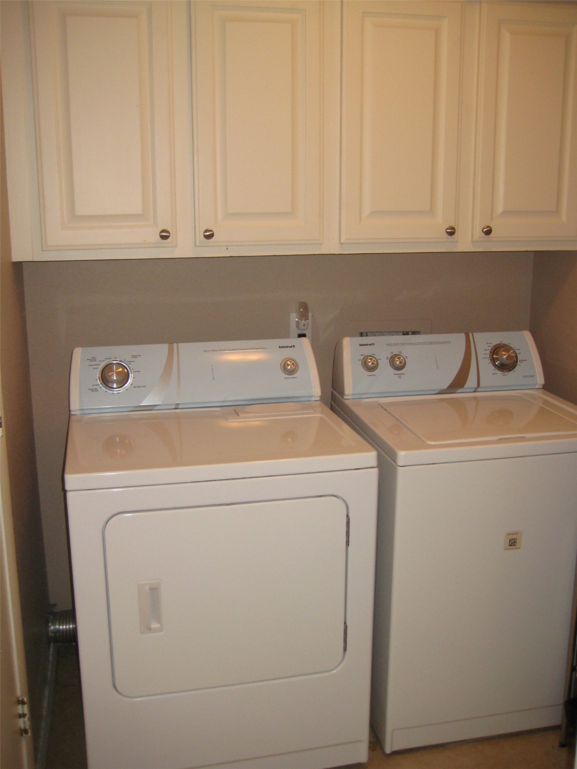 11002 Hammerly Boulevard, Unit 200 Houston, TX 77043 - Photo 13 of 17 a utility room with dryer and washer