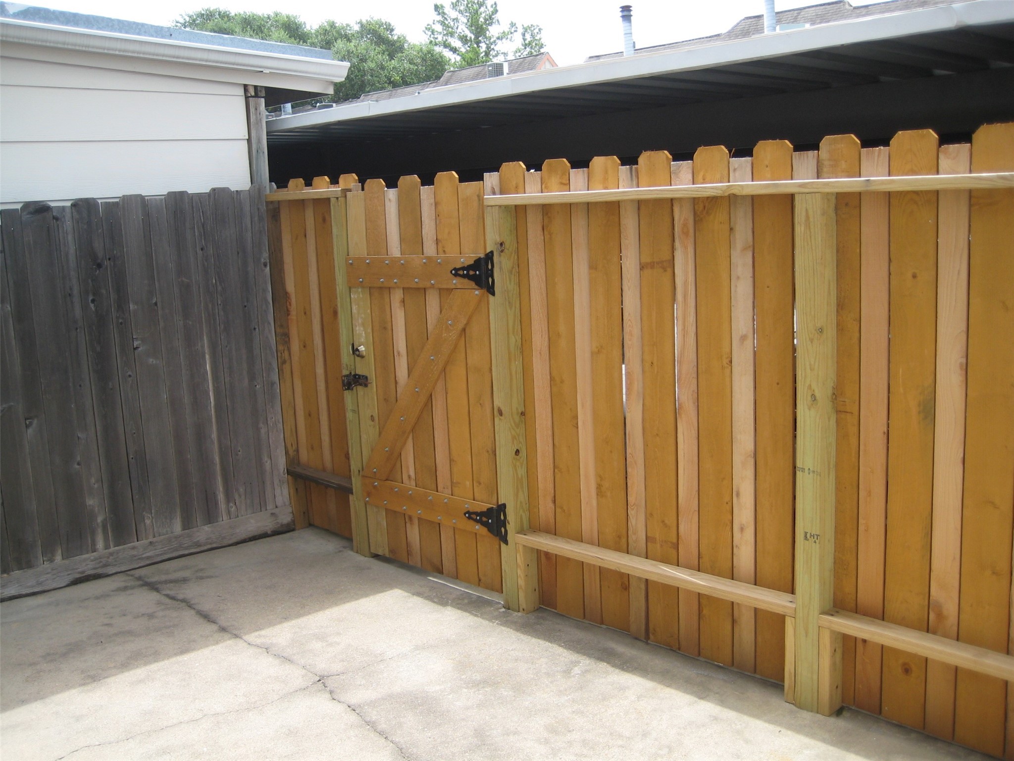 11002 Hammerly Boulevard, Unit 200 Houston, TX 77043 - Photo 14 of 17 a view of a wooden door