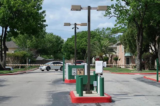 a view of street with parked cars