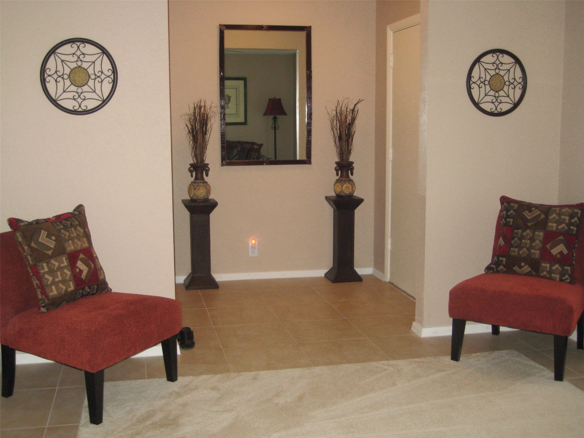 11002 Hammerly Boulevard, Unit 200 Houston, TX 77043 - Photo 3 of 17 a view of a hallway with elevator stairs and a mirror