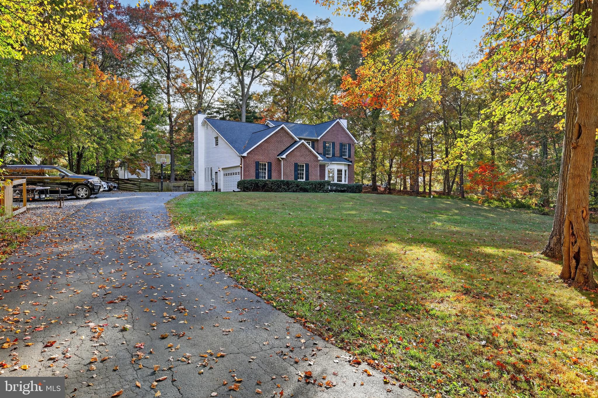 7328 Rocky Road Gaithersburg, MD 20882 - Photo 2 of 33 a front view of a house with garden