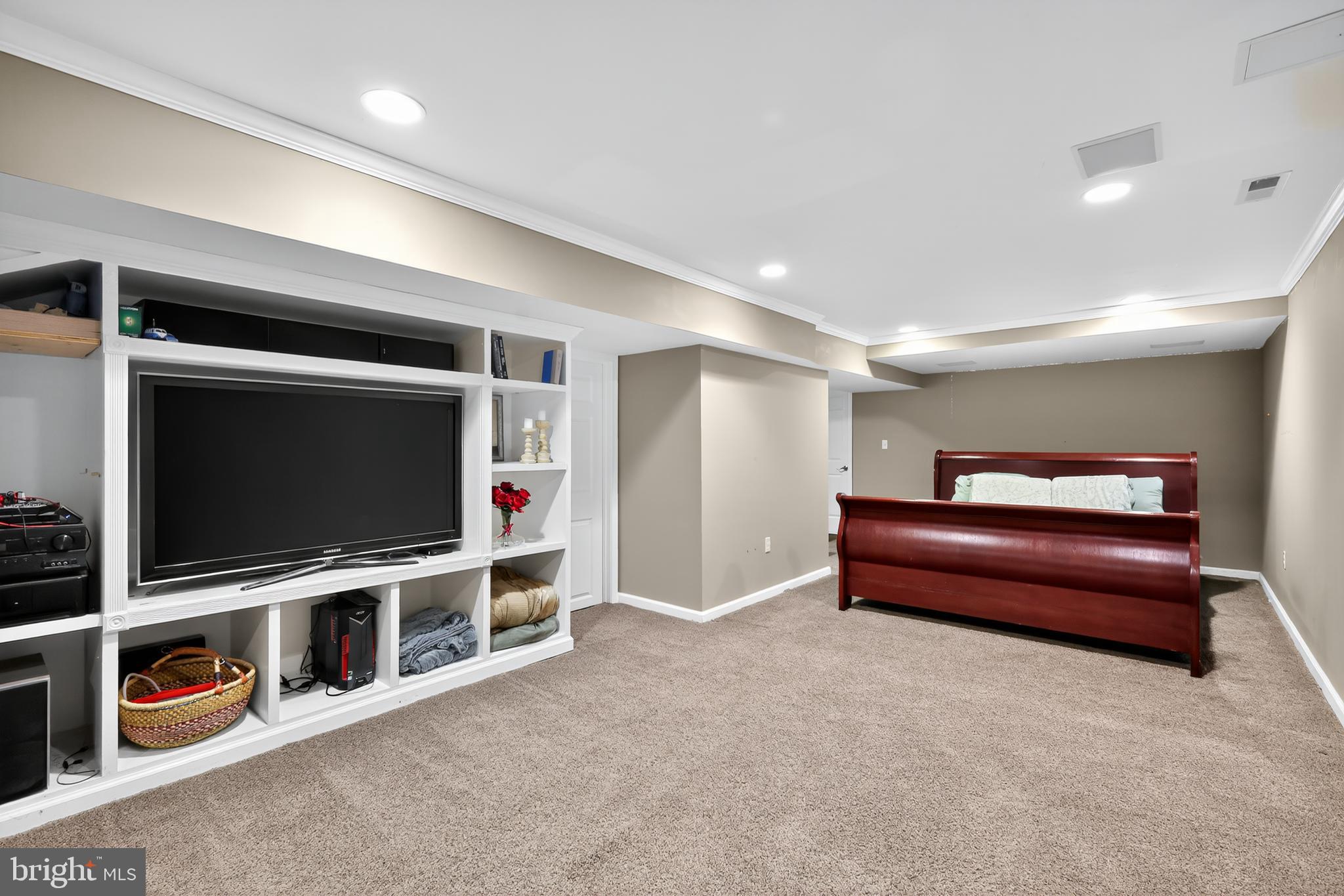 7328 Rocky Road Gaithersburg, MD 20882 - Photo 21 of 33 a living room with furniture and a flat screen tv