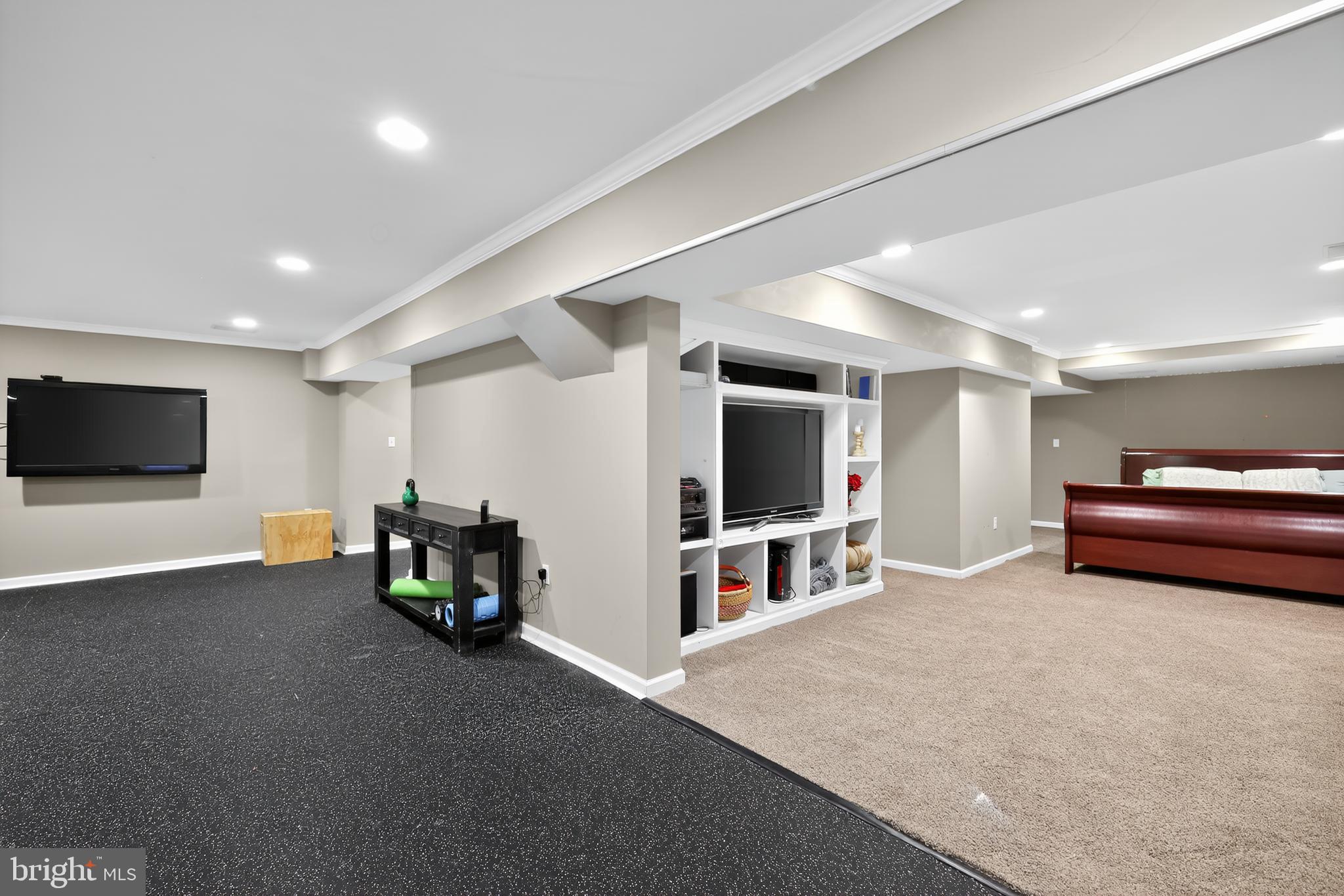 7328 Rocky Road Gaithersburg, MD 20882 - Photo 22 of 33 a living room with furniture and a flat screen tv