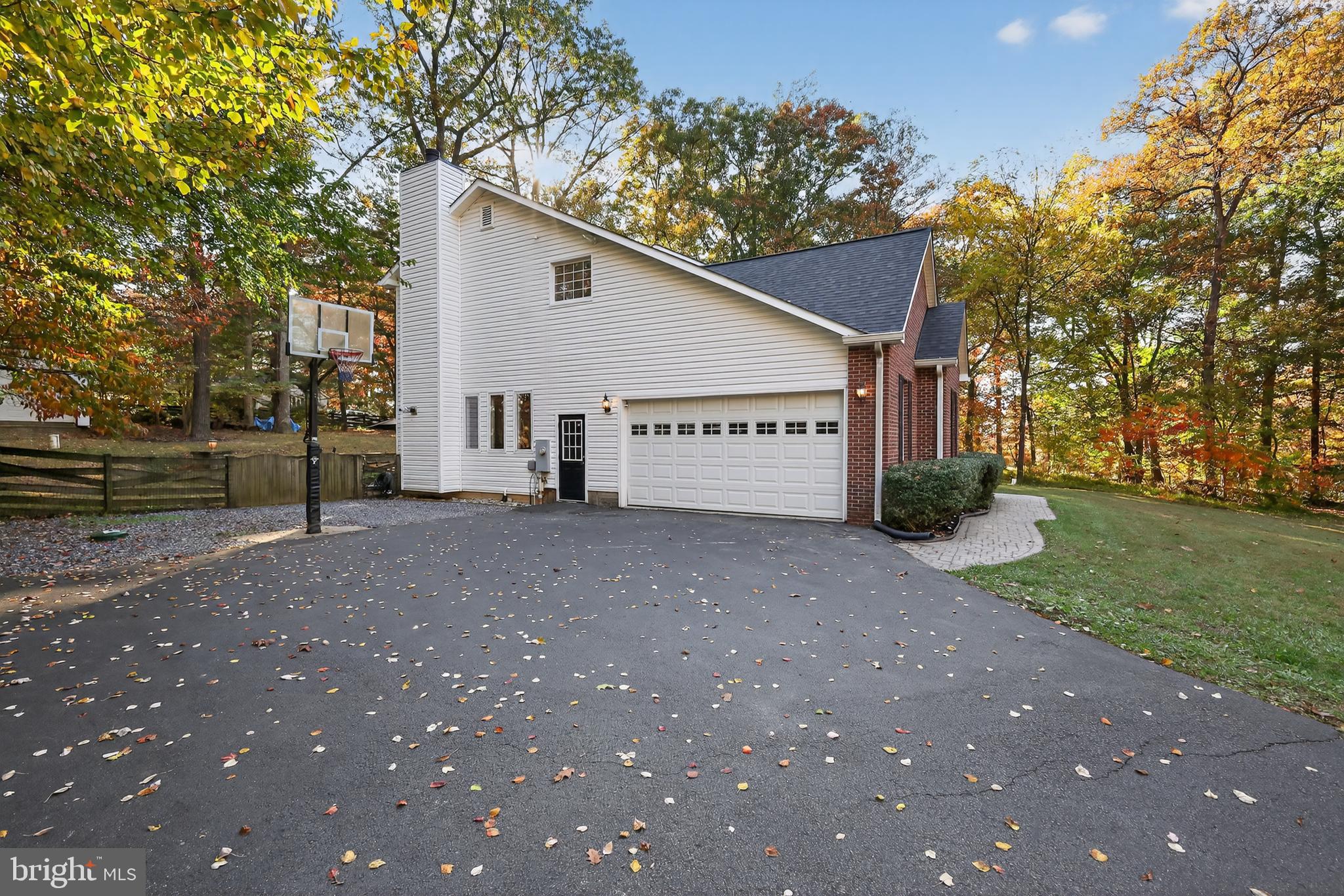 7328 Rocky Road Gaithersburg, MD 20882 - Photo 3 of 33 a view of a house with a park