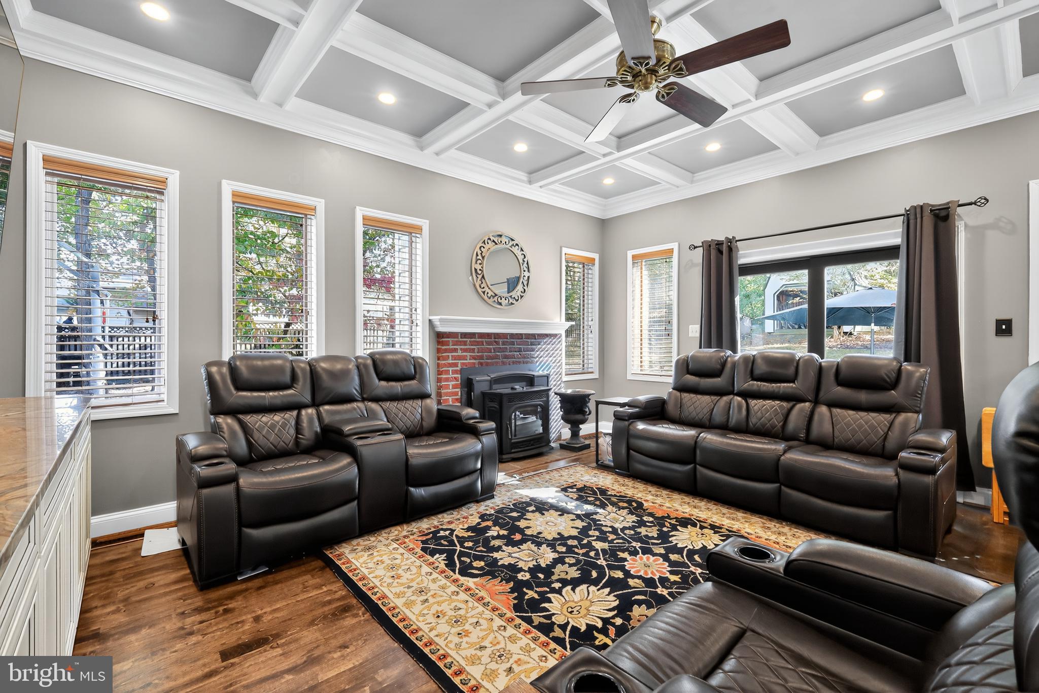 7328 Rocky Road Gaithersburg, MD 20882 - Photo 8 of 33 a living room with furniture ceiling fan and a window