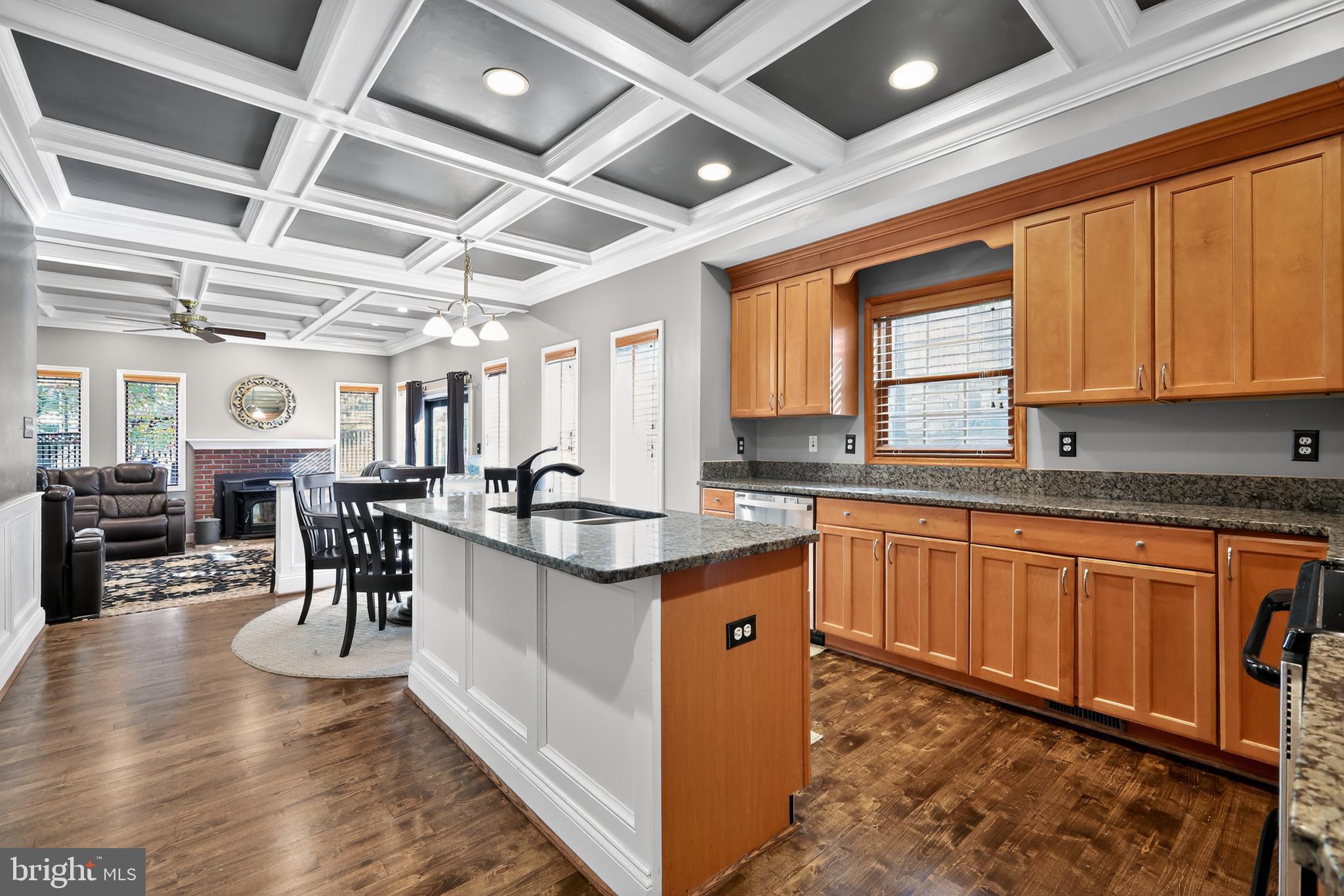 7328 Rocky Road Gaithersburg, MD 20882 - Photo 10 of 33 a kitchen with lots of counter top space and dining table