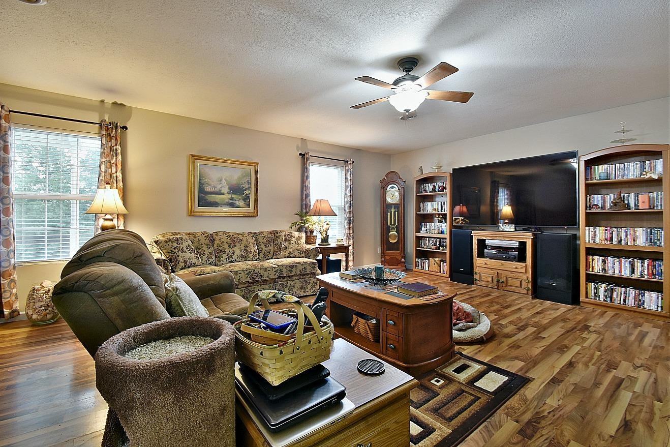 950 Chestnut Grove Road Dandridge, TN 37725 - Photo 4 of 25 a living room with furniture and a flat screen tv