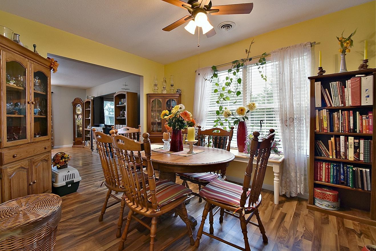 950 Chestnut Grove Road Dandridge, TN 37725 - Photo 8 of 25 a view of a dining room with furniture window and wooden floor