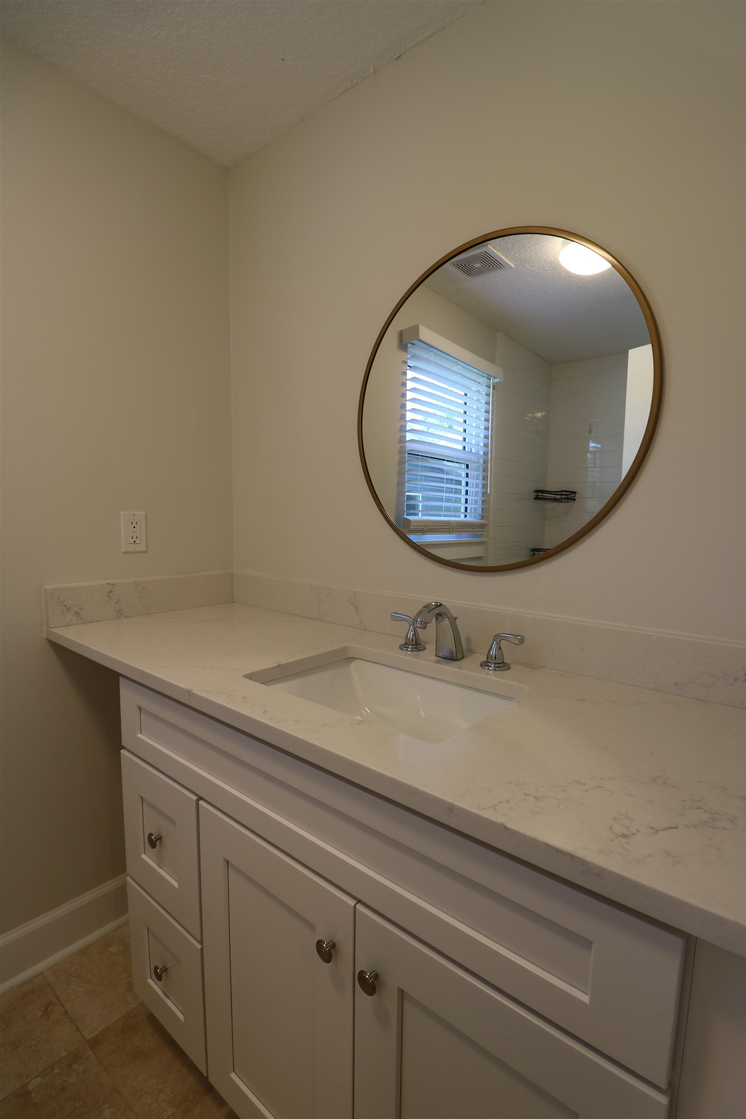 96 Barbarosa Street St. Augustine, FL 32086 - Photo 11 of 17 a bathroom with a sink and mirror