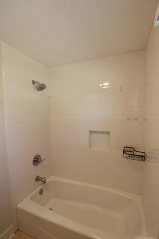 a bathroom with a bathtub